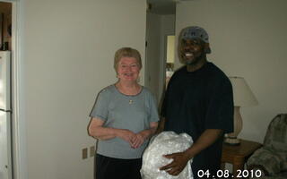 The client is standing with the All Jersey Movers guy