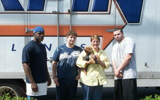 Client standing with All Jersey Movers guys