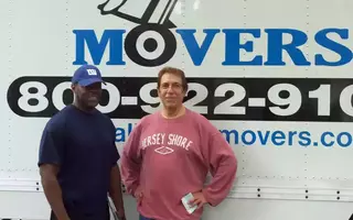 AJM team member with client after moving service